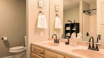 Shower, towels, soap, toilet paper
