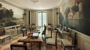 A formal dining room with a long table, chairs, and a large painting on the wall. - Magnificent family home, 7 bedrooms, 13 beds, 5' zoo Beauval (Seigy)