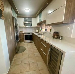 Private kitchen - Cozy 2-bedroom apartment steps to the beach in charming Río Grande (Río Grande)