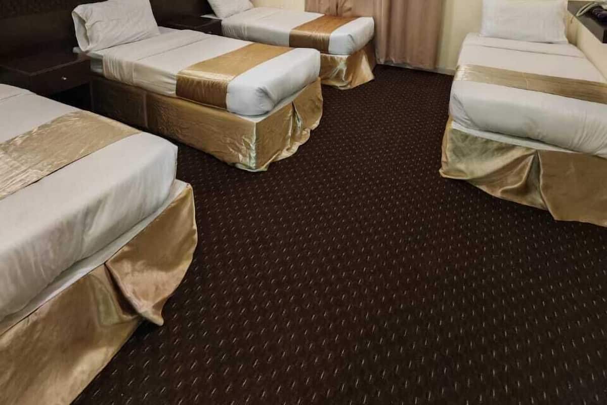 Basic Quadruple Room | In-room safe, blackout curtains, soundproofing