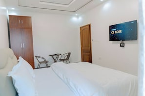 Deluxe Room, Balcony, City View | Iron/ironing board - Dorlan Hotel (Kigali)