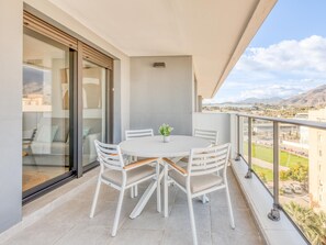 Outdoor dining - Modern Penthouse in Estepona with parking and stunning views (Estepona)