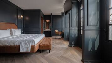 1 bedroom, desk, iron/ironing board, travel crib