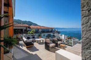 Terrace/patio - Nomada Retreat | Luxury Condo w/ Rooftop Pool (Puerto Vallarta)
