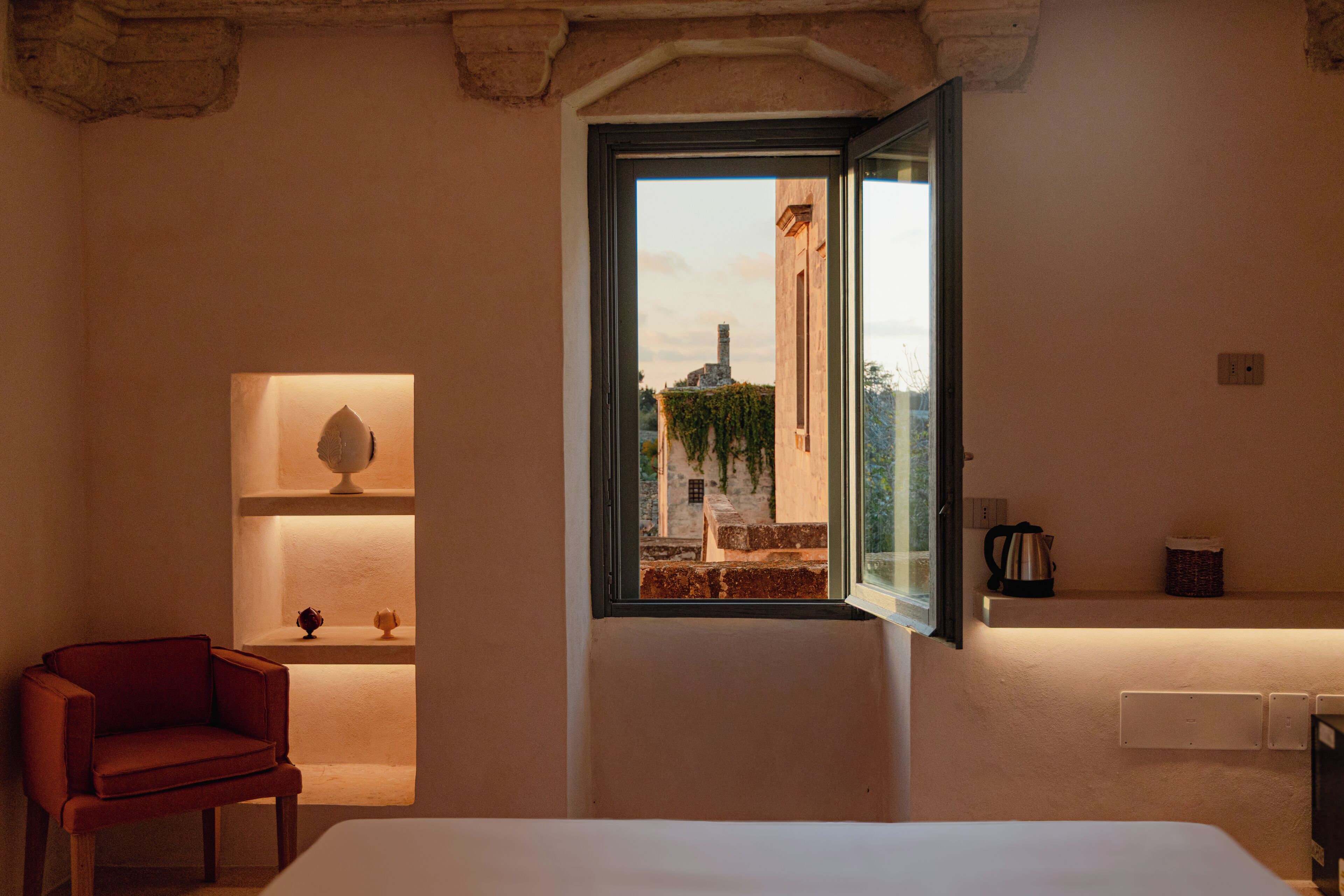 Luxury Suite, Courtyard View | In-room safe, desk, blackout drapes, soundproofing