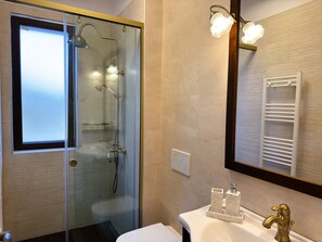 Hair dryer, towels, soap, toilet paper