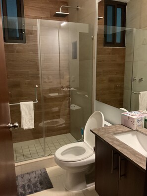 Shower, hair dryer, towels, soap