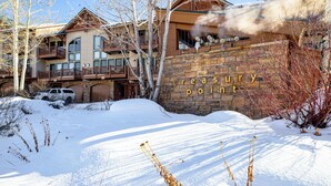 A building with a stone facade and a sign reading "treasury point." - Walk to Lift! Luxe, Updated CBMR Home w/ Mtn Views (Gunnison)