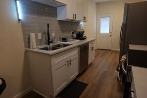 Fridge, microwave, oven, stovetop - 2 bedroom stylish home with entertainment Room and in prime Houston location (Houston)