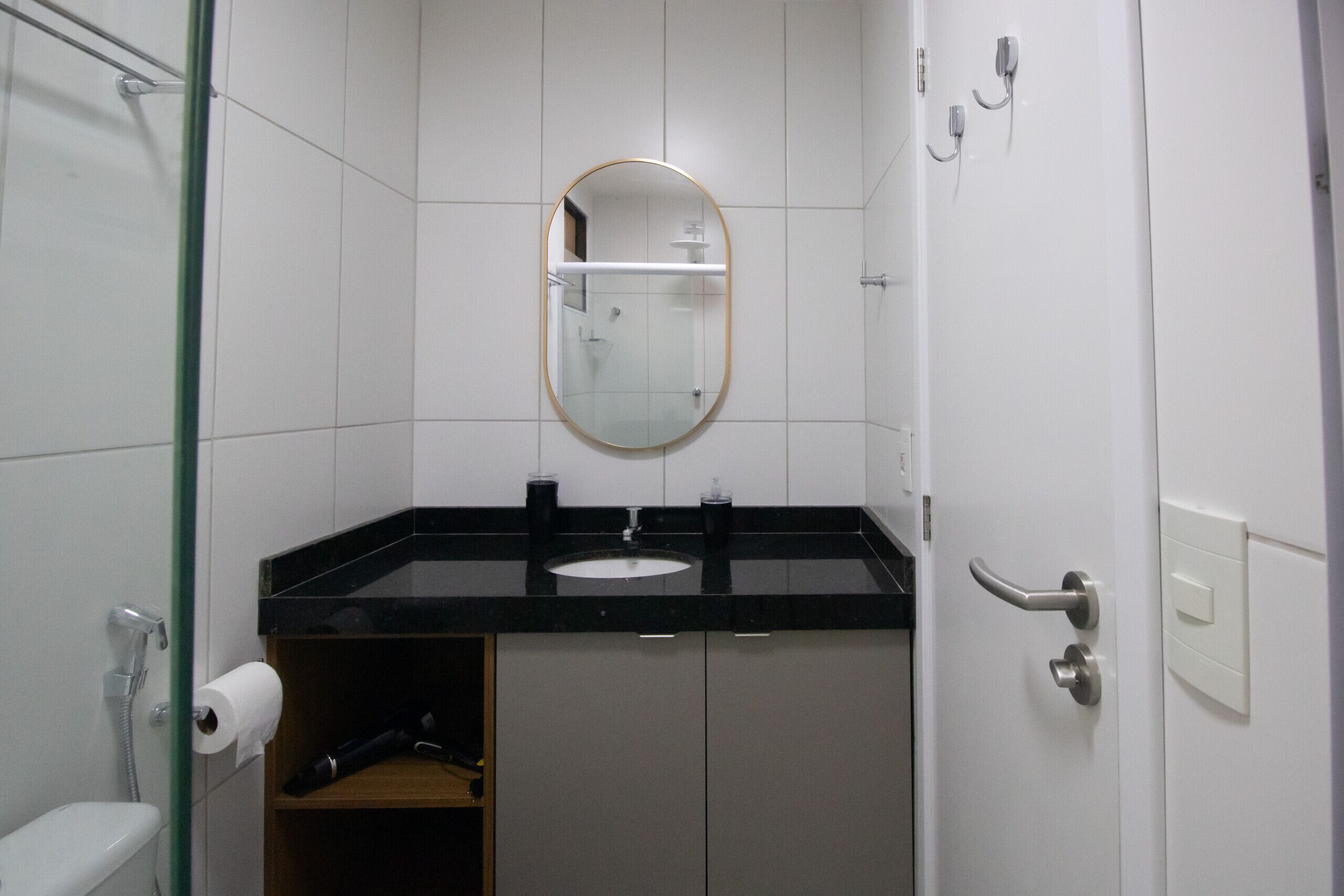 Shower, hair dryer, towels