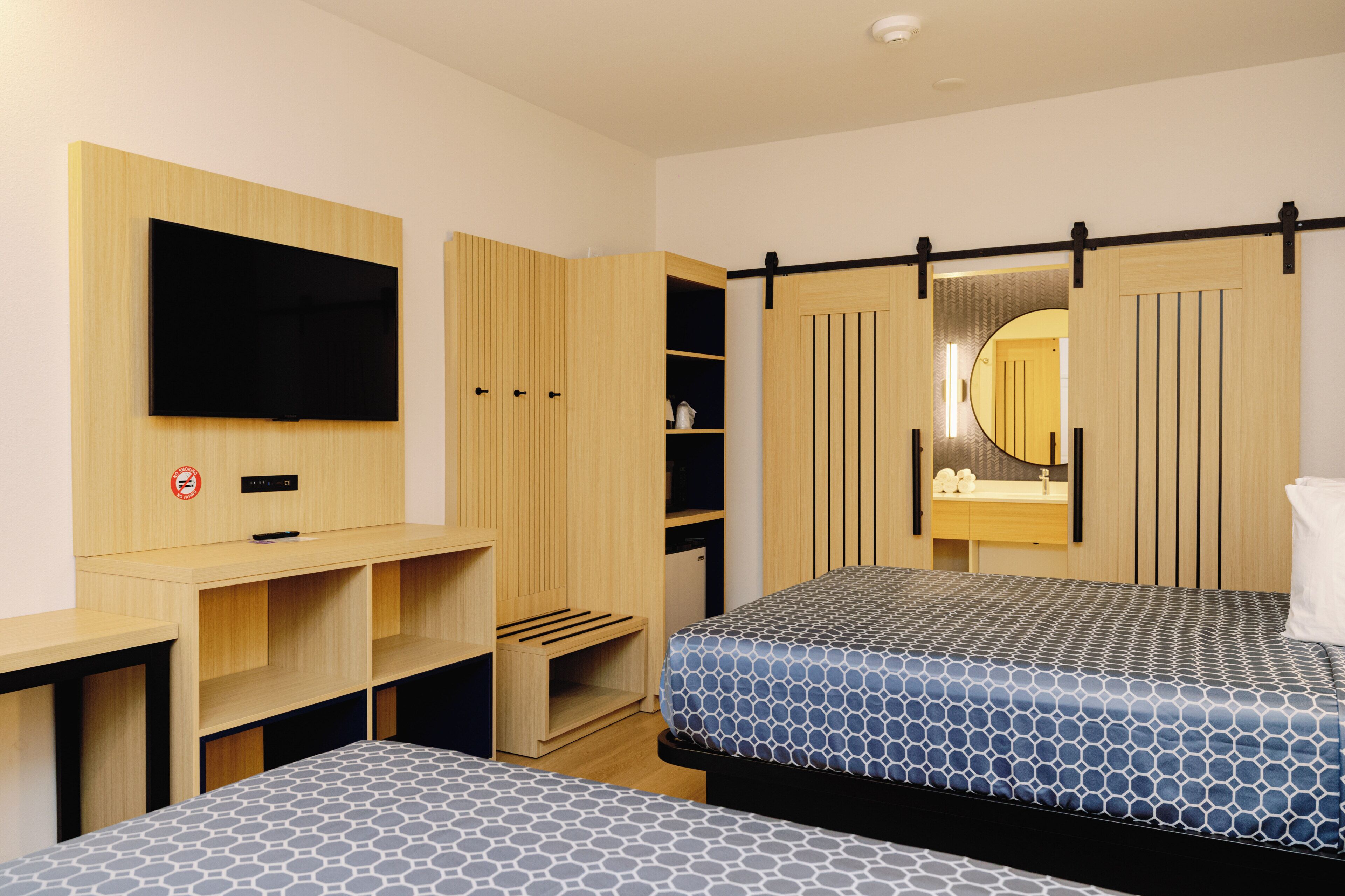 Memory foam beds, desk, laptop workspace, blackout drapes