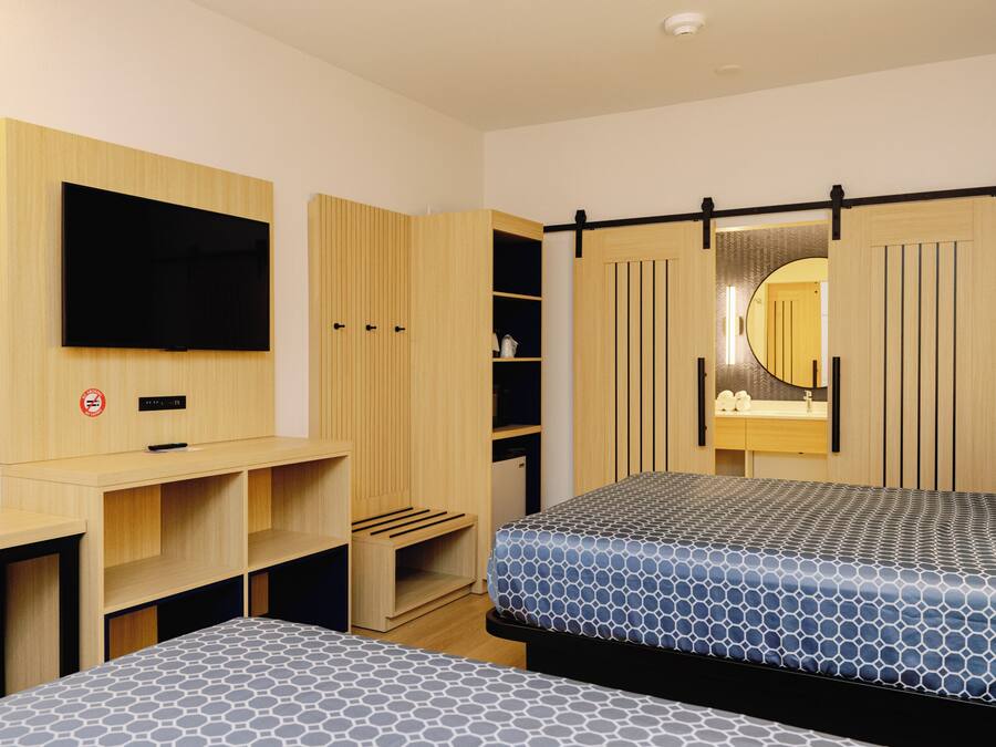 Memory-foam beds, desk, laptop workspace, blackout curtains