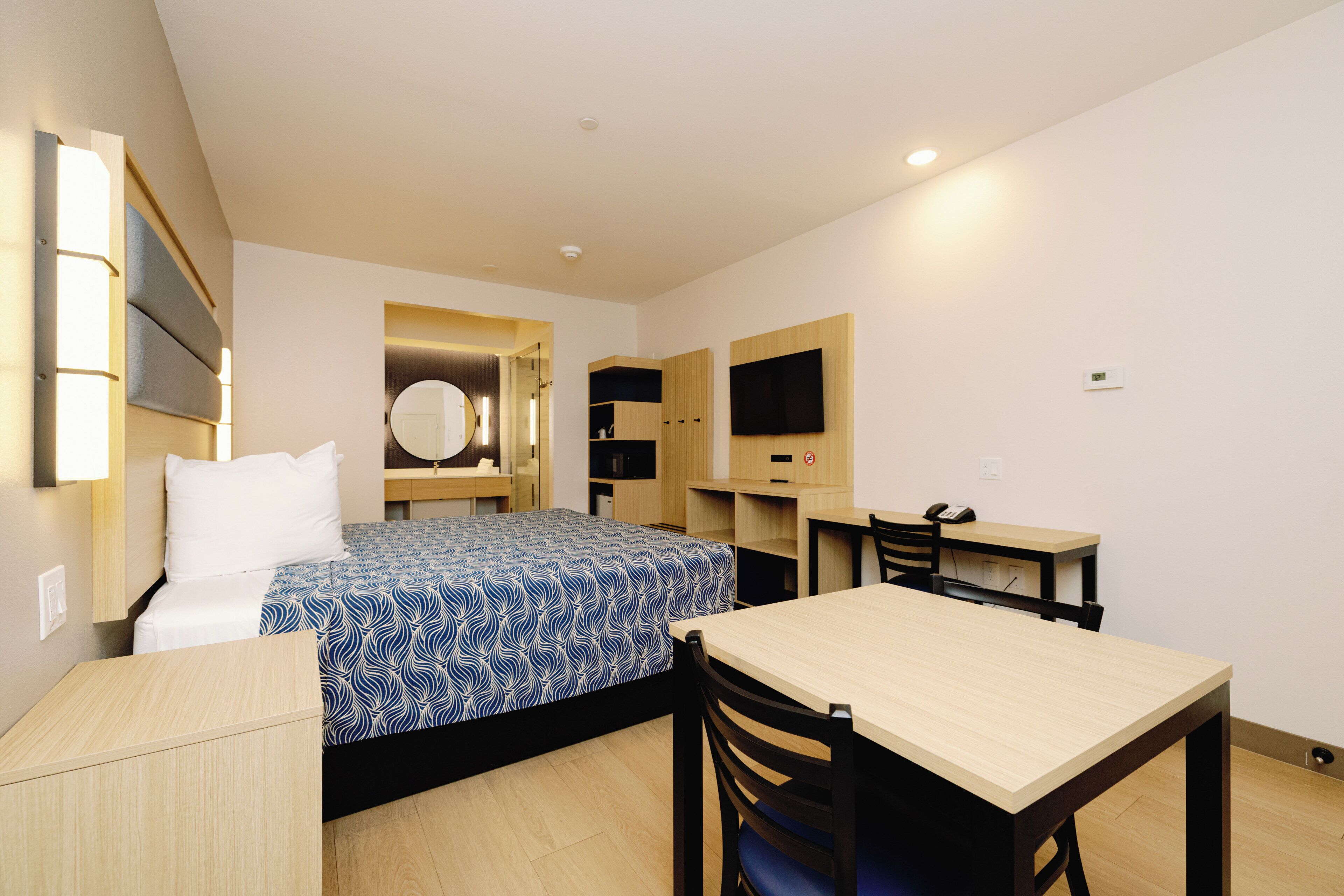 Memory-foam beds, desk, laptop workspace, blackout curtains