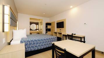 Memory-foam beds, desk, laptop workspace, blackout curtains