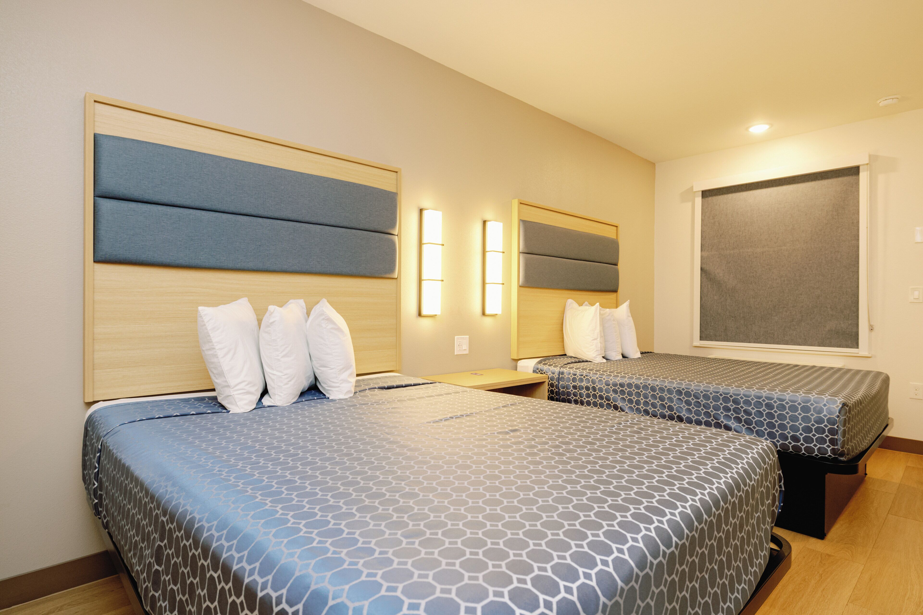 Memory-foam beds, desk, laptop workspace, blackout curtains