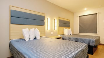 Memory-foam beds, desk, laptop workspace, blackout curtains