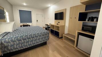 Deluxe Single Room | Memory-foam beds, desk, laptop workspace, blackout curtains