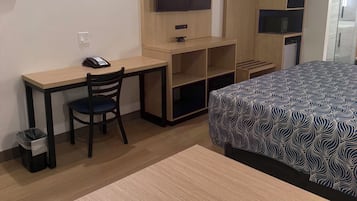 Deluxe Single Room | Memory-foam beds, desk, laptop workspace, blackout curtains
