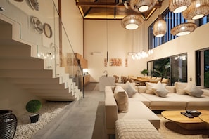 5br Kencana Villa with Private Pool | Living room | 43-inch Smart TV with satellite channels