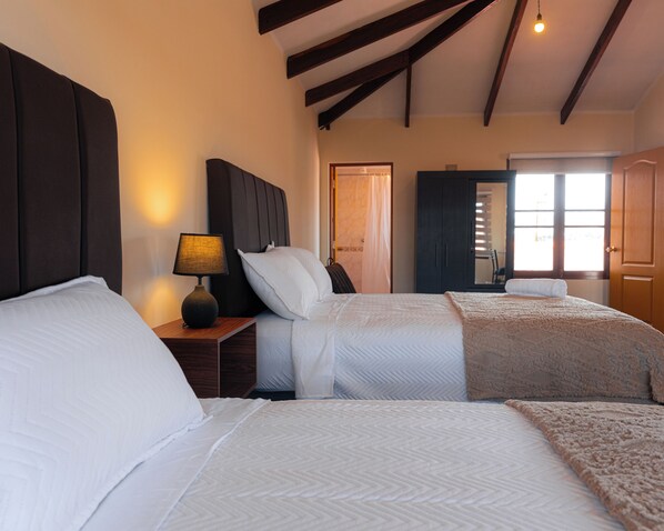 Casa Confort, vista a la ciudad | Escritorio, espacio para trabajar con laptop y wifi gratis 