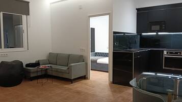 Comfort appartement, uitzicht op tuin | Woonruimte