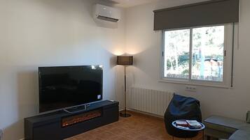 Apartamento Confort, vistas al jardín | Zona de estar