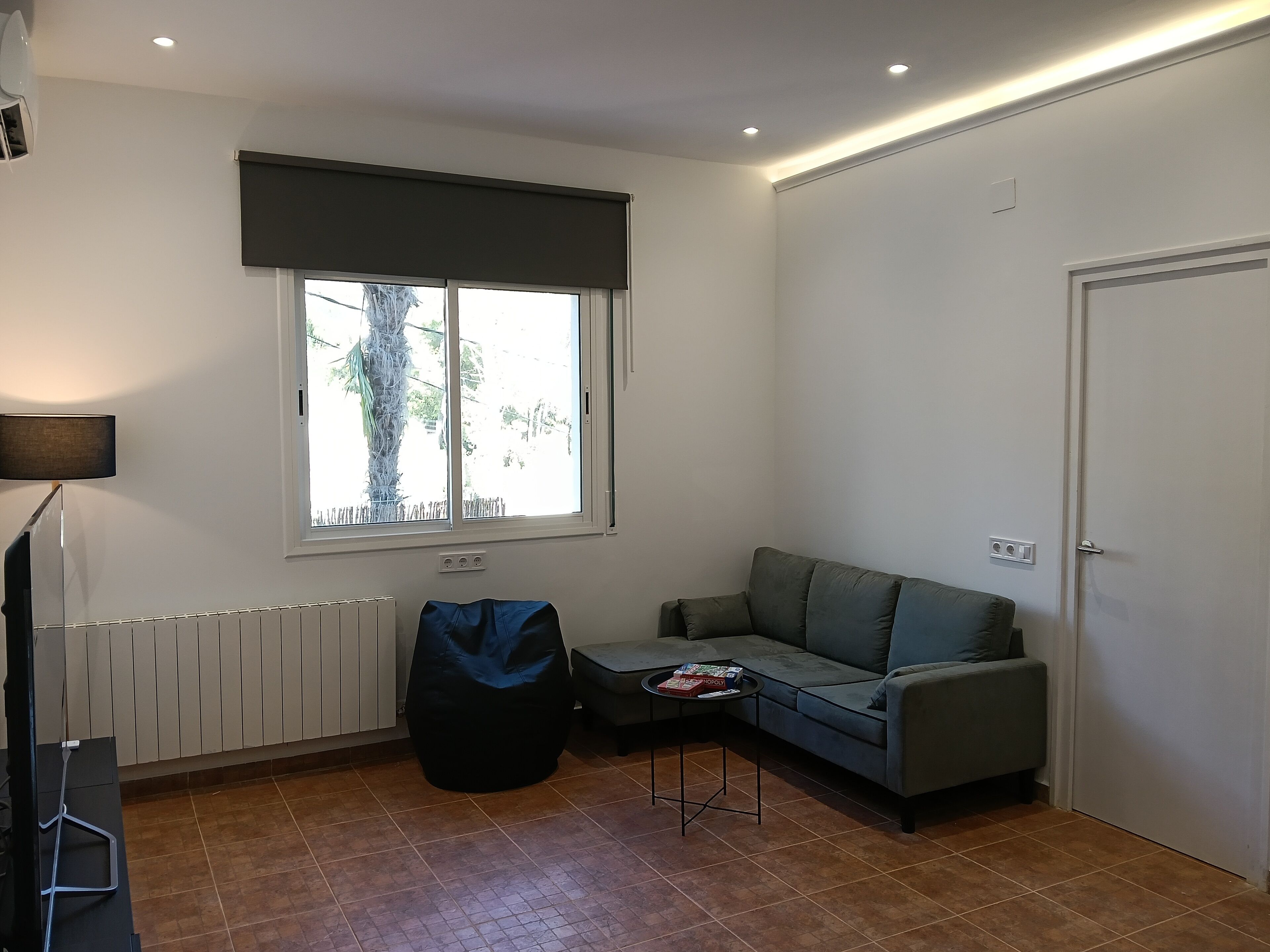 Appartement Confort, vue jardin | Coin séjour