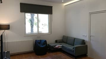 Comfort Apartment, Garden View | Living area