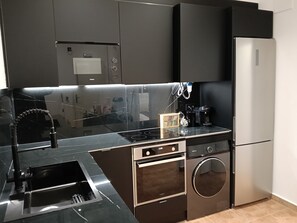 Apartamento Confort, vistas al jardín | Cocina privada