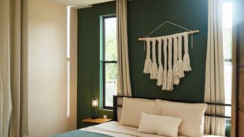 Deluxe Villa, Patio, Pool View | In-room safe, individually decorated, individually furnished, desk