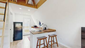 Fridge, microwave, stovetop, coffee/tea maker