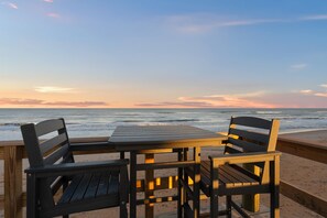 Outdoor dining - Coastal Home Retreat with Rooftop Deck/Private Beachfront Deck-Steps to the Beach (Flagler Beach)