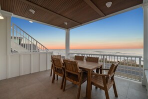 Outdoor dining - Coastal Home Retreat with Rooftop Deck/Private Beachfront Deck-Steps to the Beach (Flagler Beach)