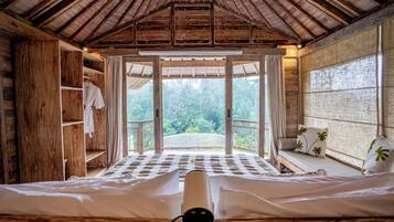 Deluxe Suite, Patio, Pool View | In-room safe, desk, laptop workspace, free WiFi