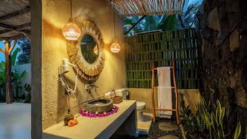 Separate tub and shower, rainfall showerhead, free toiletries