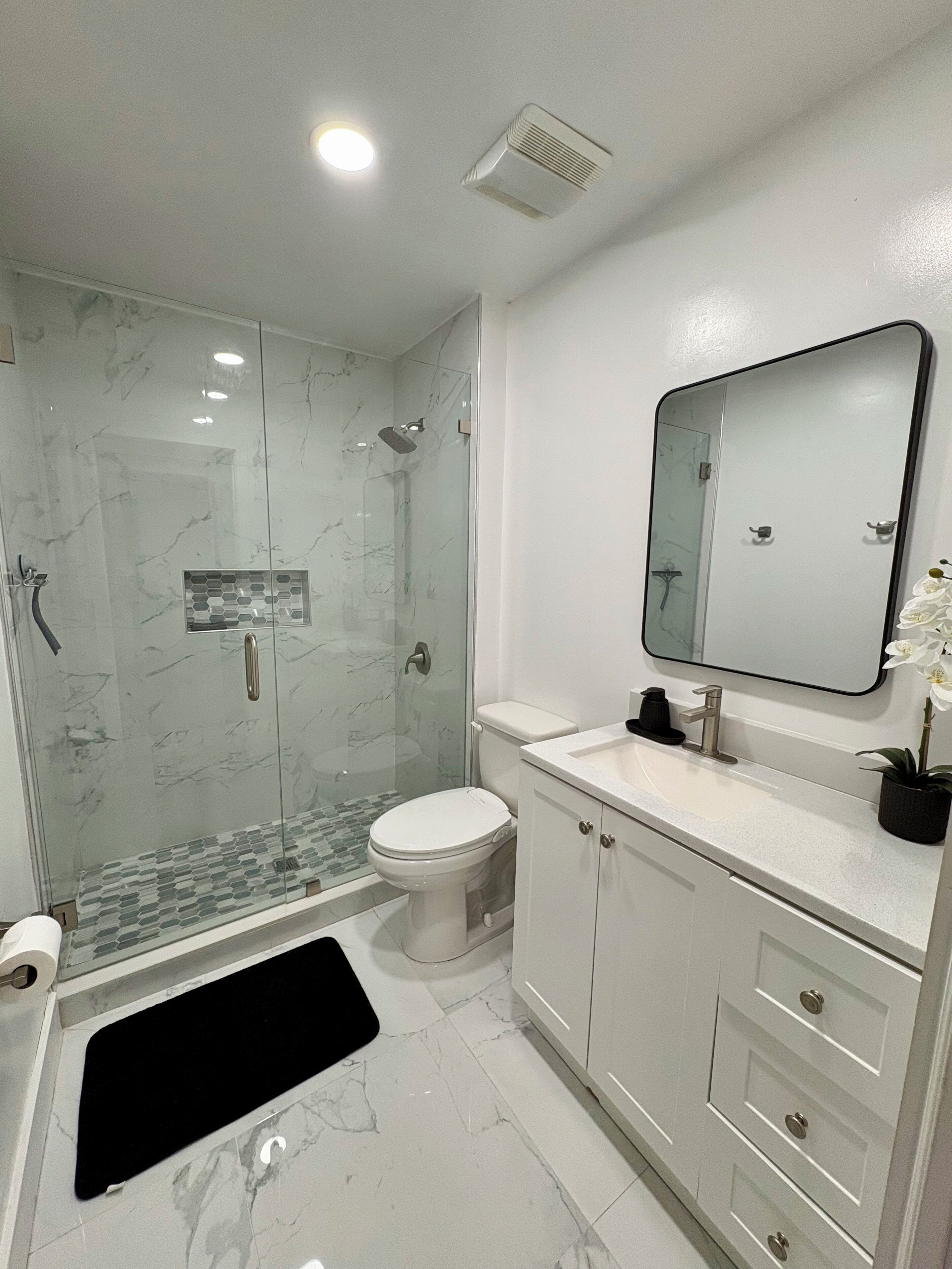 Hair dryer, towels, soap, toilet paper