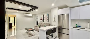 Jobos Beach Escape - Premium 2BR · 2 Private Baths · 1 Block to Beach.