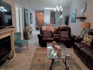 TV, fireplace - Waterfront Luxury Condo – Sleeps 6 (Little River)