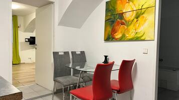 Apartamento básico | Sala de jantar