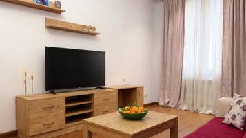 Deluxe Apartment, 1 Bedroom, Balcony, Courtyard View | Soundproofing, free WiFi