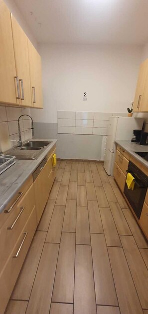 Appartement | Cuisine privée | Réfrigérateur, micro-ondes, four, plaque de cuisson