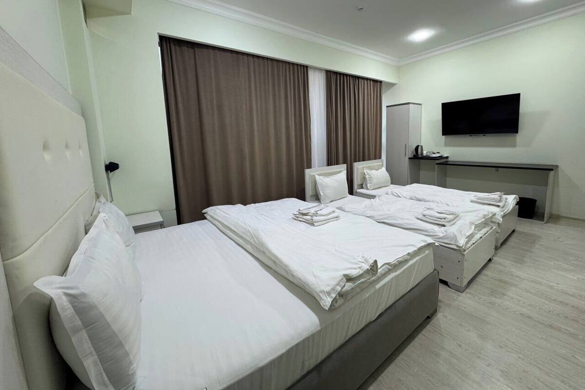 Standard fyrbäddsrum - utsikt mot staden