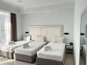 基本三人房, 城市景