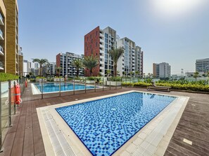 Outdoor pool - Superhost Modern 1BR in Azizi Riviera (Dubai)
