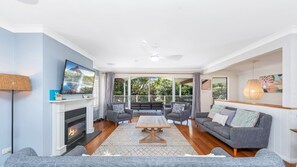 TV, fireplace - Indys Beach House by HolidayCo. (KILLCARE)