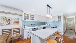 Microwave, oven, stovetop, dishwasher - Indys Beach House by HolidayCo. (KILLCARE)
