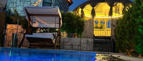 Outdoor pool, free pool cabanas, pool umbrellas