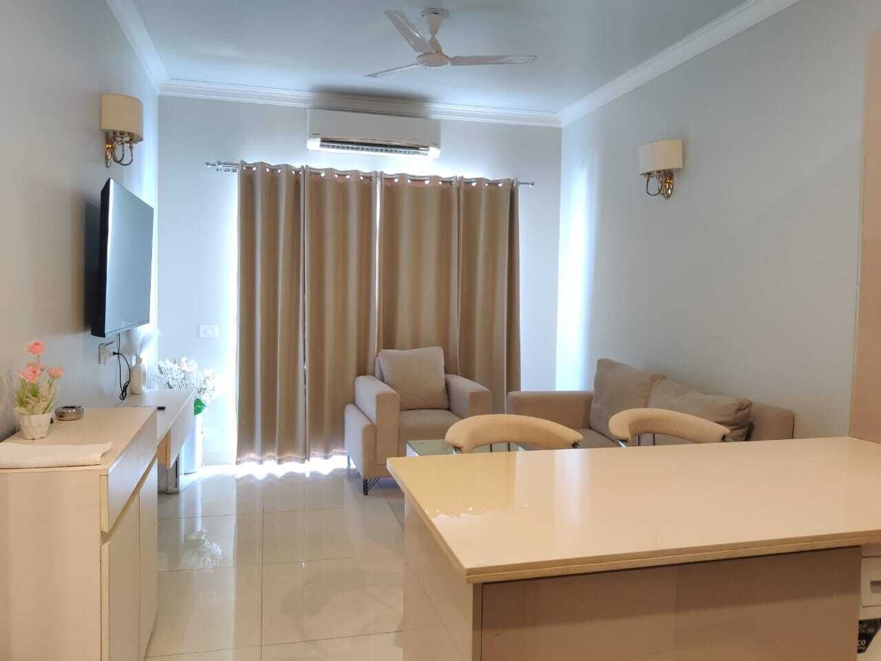 Apartemen Mewah | Area keluarga | Televisi layar datar 32-inci dengan saluran TV kabel