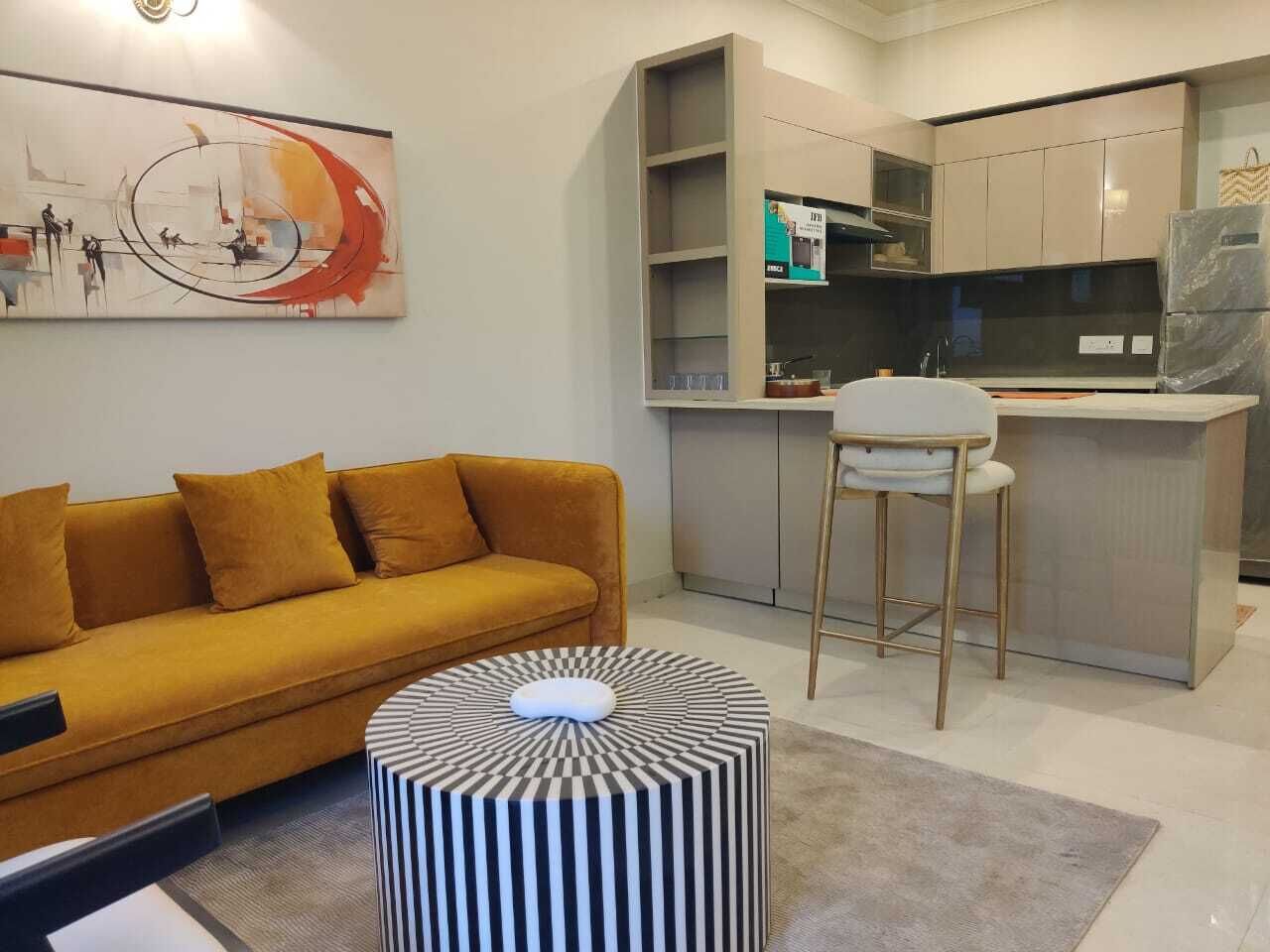 Luxury Apartment | Living area | 32-inch flat-screen TV with cable channels