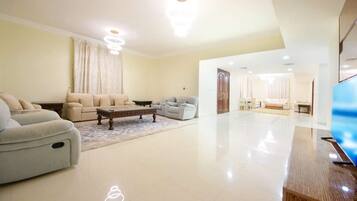 Télévision LED de 64 pouces avec chaînes numériques